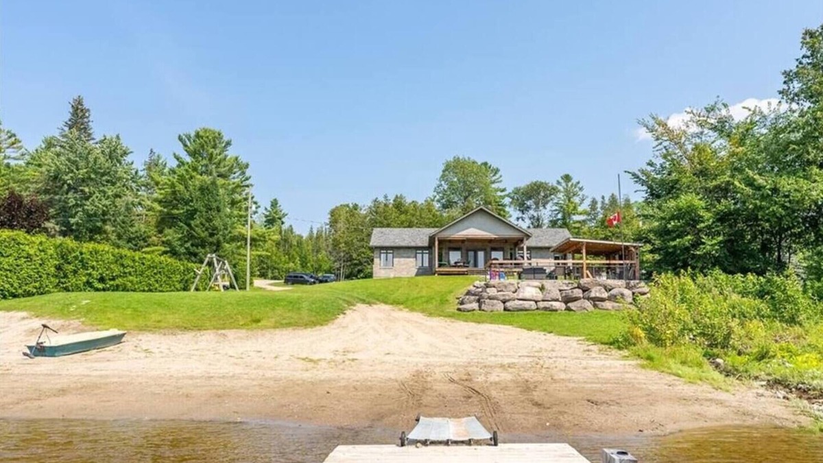 Whitewater Region House | Luxury Beachfront Cottage w Hot tub, Sauna & Bar