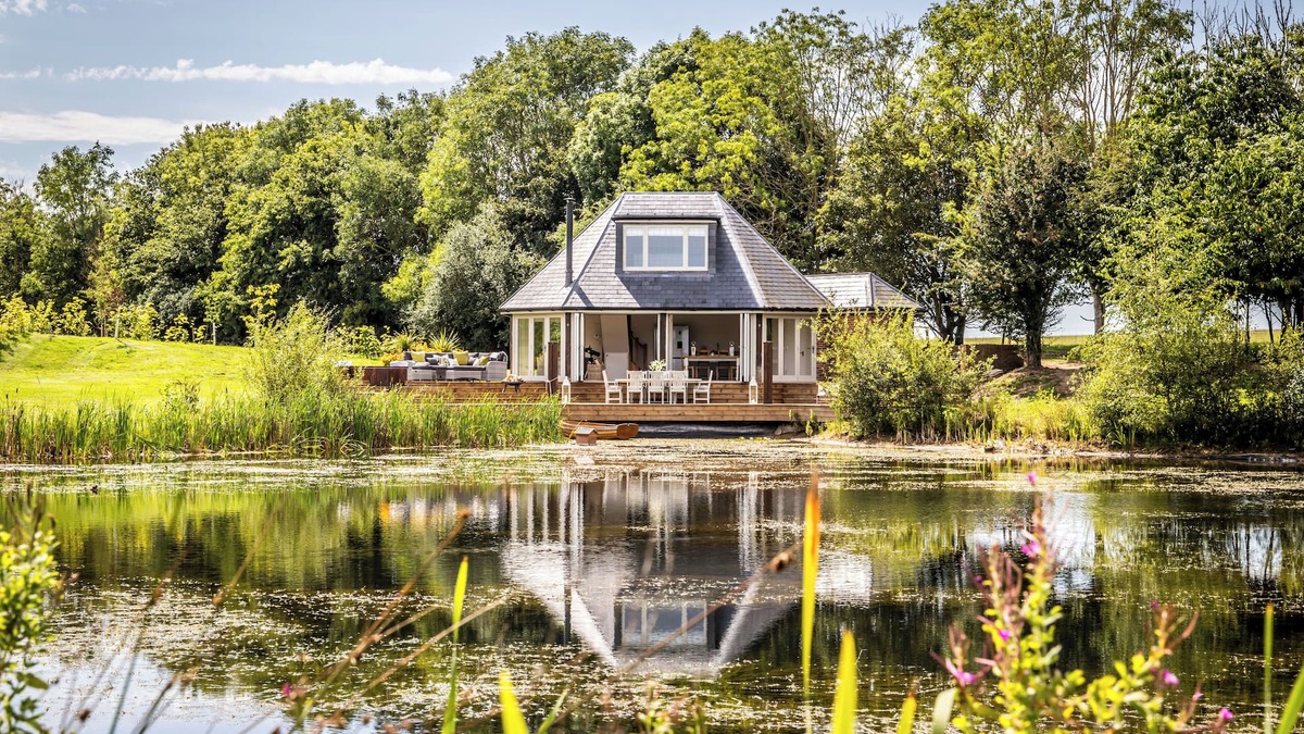 Barns Green House | Luxury Boathouse situated on a private lake, with panoramic views and a hot tub.