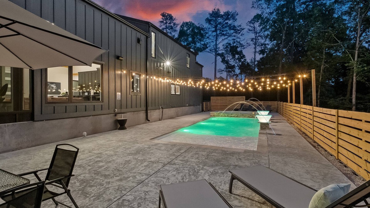 Rogers Cabin | Luxury cabin lined by trees with pool, oversized sunroom, hot tub & grill