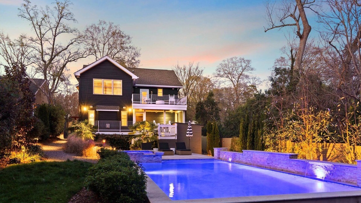 Commonwealth Park House | Luxury Charlotte Home with Stunning Pool & Hot Tub & Waterfalls
