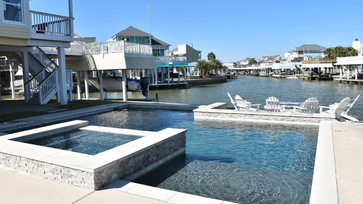 Isla Del Sol House | Luxury Galveston Waterfront Escape – Amazing Pool, Spa & Canal Views!