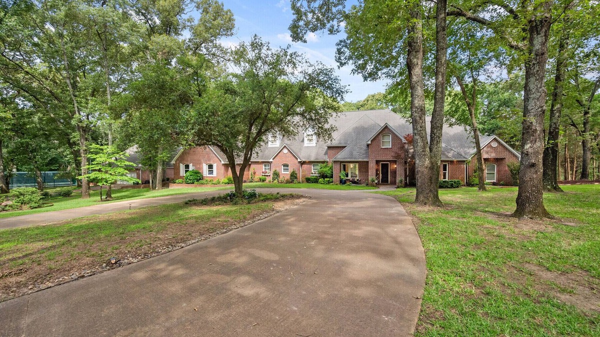 Athens House | Luxury home on 27 wooded acres with two private lakes in Athens, Texas.