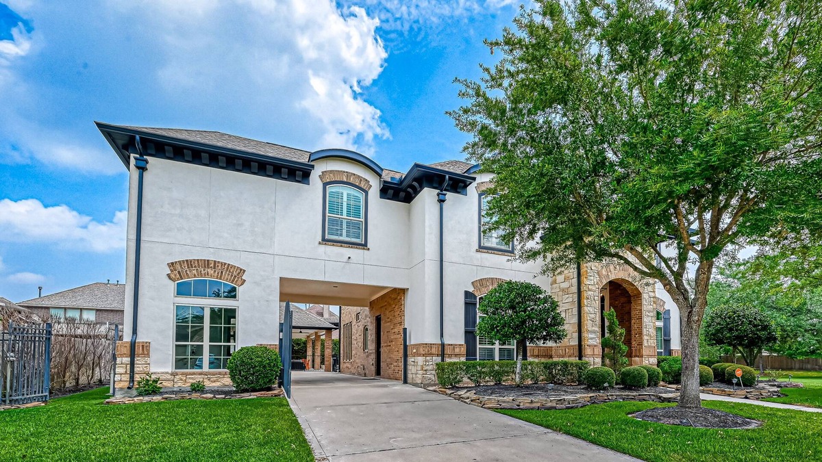 Cypress House | Luxury home with immaculate design, outdoor & chef's kitchen, home gym