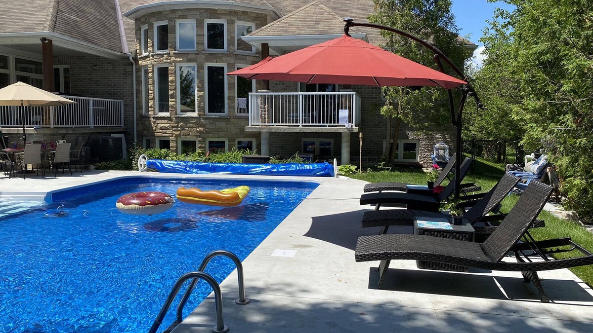 Carden House | Luxury Lake Home with Hot Tub and Pool
