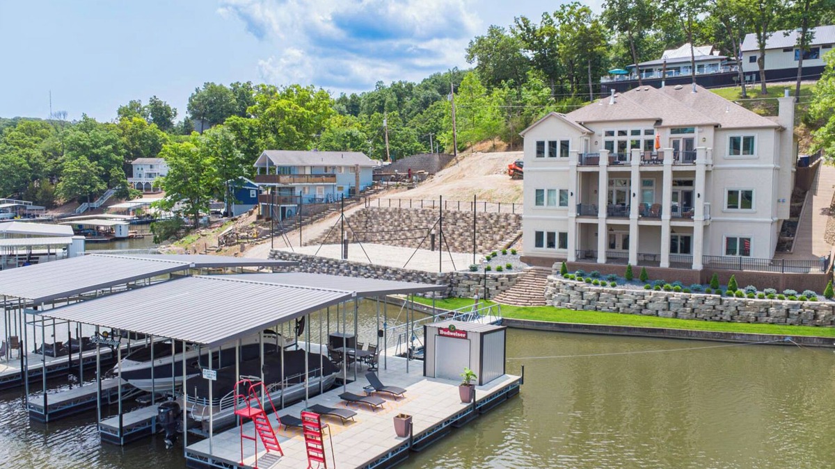 Osage Beach House | Luxury Lakefront Dream Home w/Boat Dock and Volleyball Court!