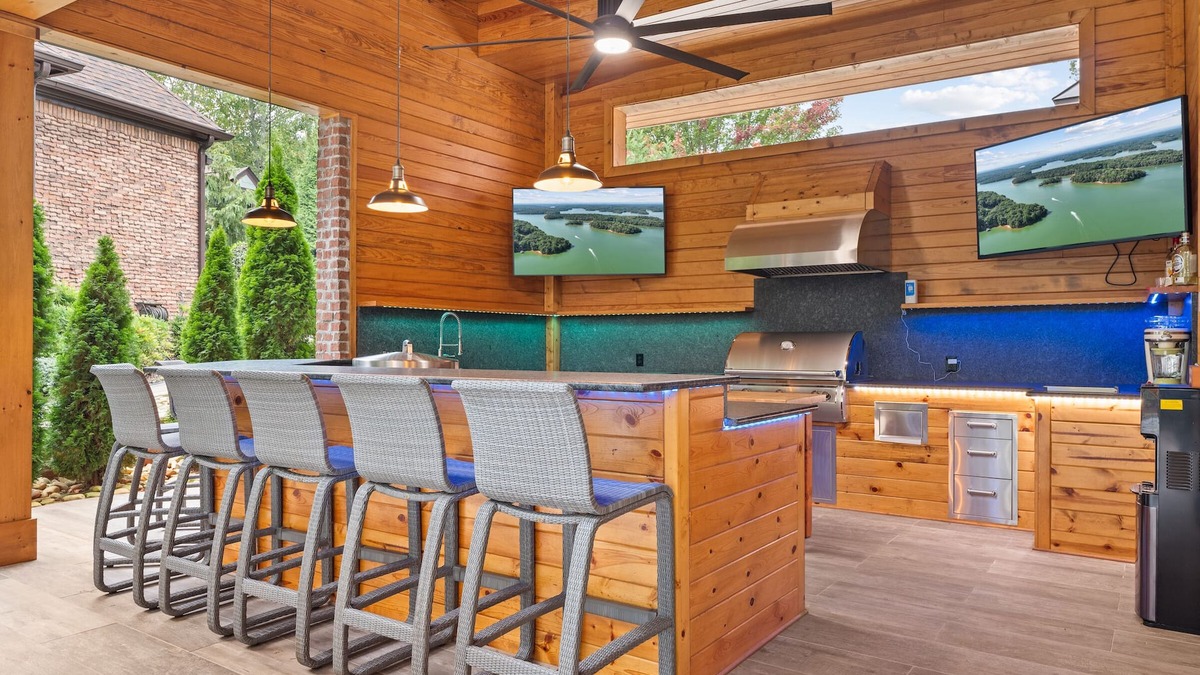 Buford House | Luxury Lakefront retreat. Privacy gate, pool and outdoor kitchen