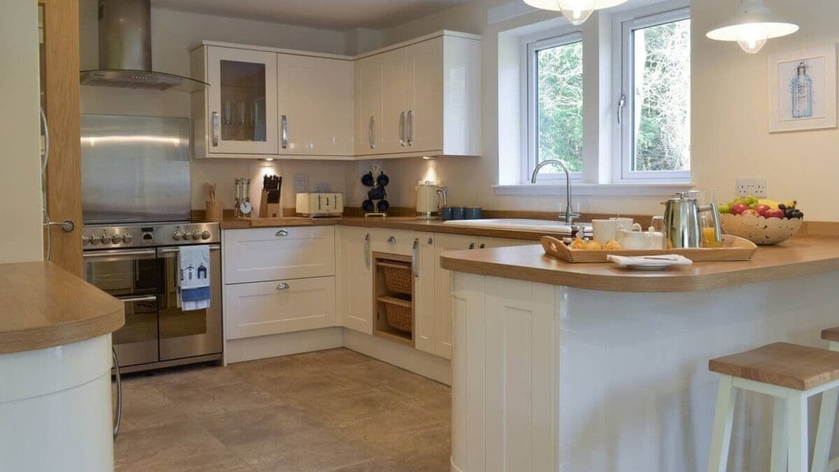 Carberry House | Luxury lodge, set in 40 acres of beautiful private gardens at Carberry Tower Estate.