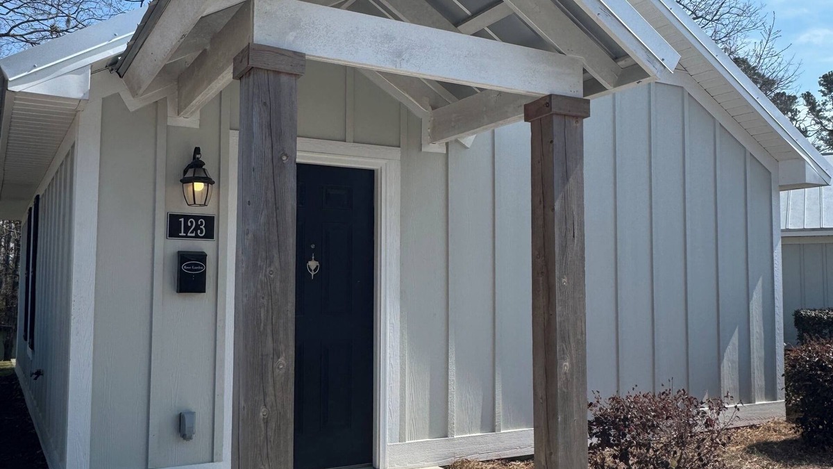 Elizabethtown Resort | Luxury Lodging, Lakefront View, King Bed w/Private Bath, Private Patio.