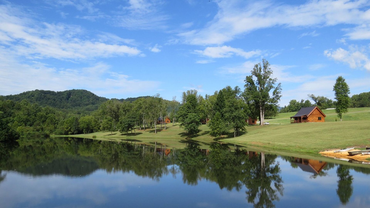 Nellysford Cabin | Luxury Log cabin on private lake. Pet Friendly!