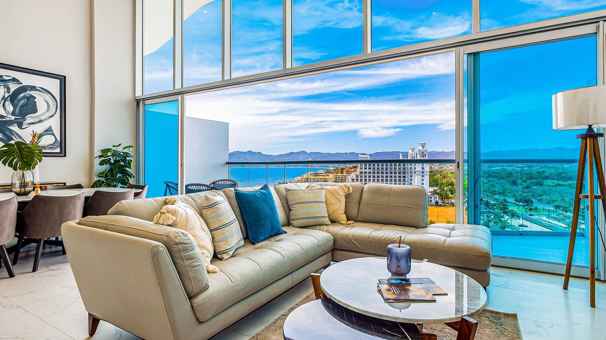 Flamingos Condo | Luxury ocean-view condo with resort pool, private balcony, and washer/dryer