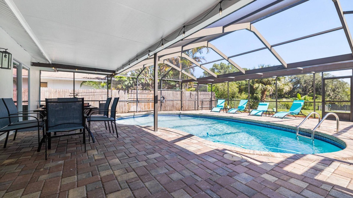 Orchid Lake Village House | Luxury Pool Home! Heated Pool, Fire Pit, Fishing Dock & More – Relaxation & Fun Await!