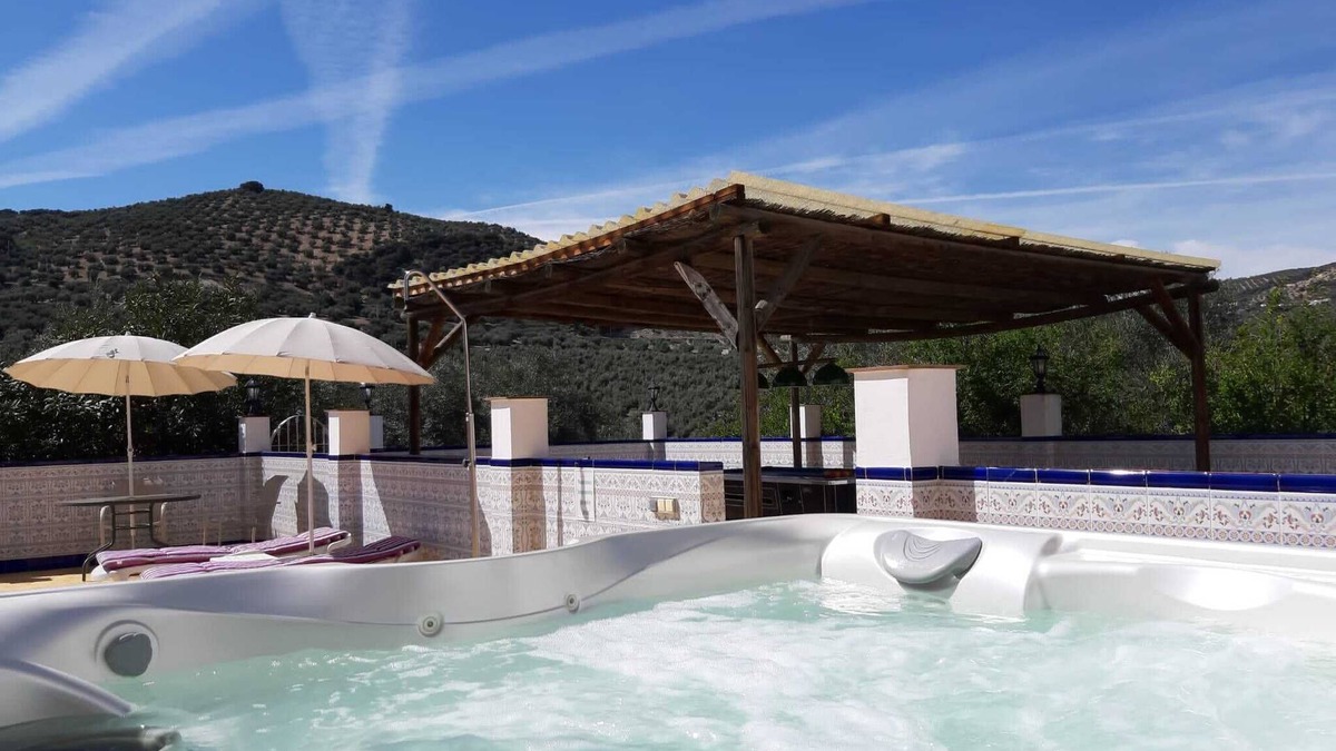 Iznajar Apartment | Luxury Poolside Apartment 1 over looking the Chlorine free Pool and Hot Tub