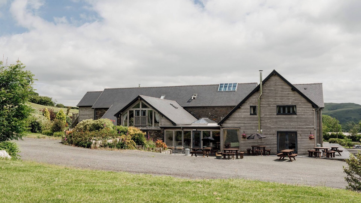 Devils Bridge House | Luxury renovated barn + countryside farmhouse with large hot tub sleeping 50