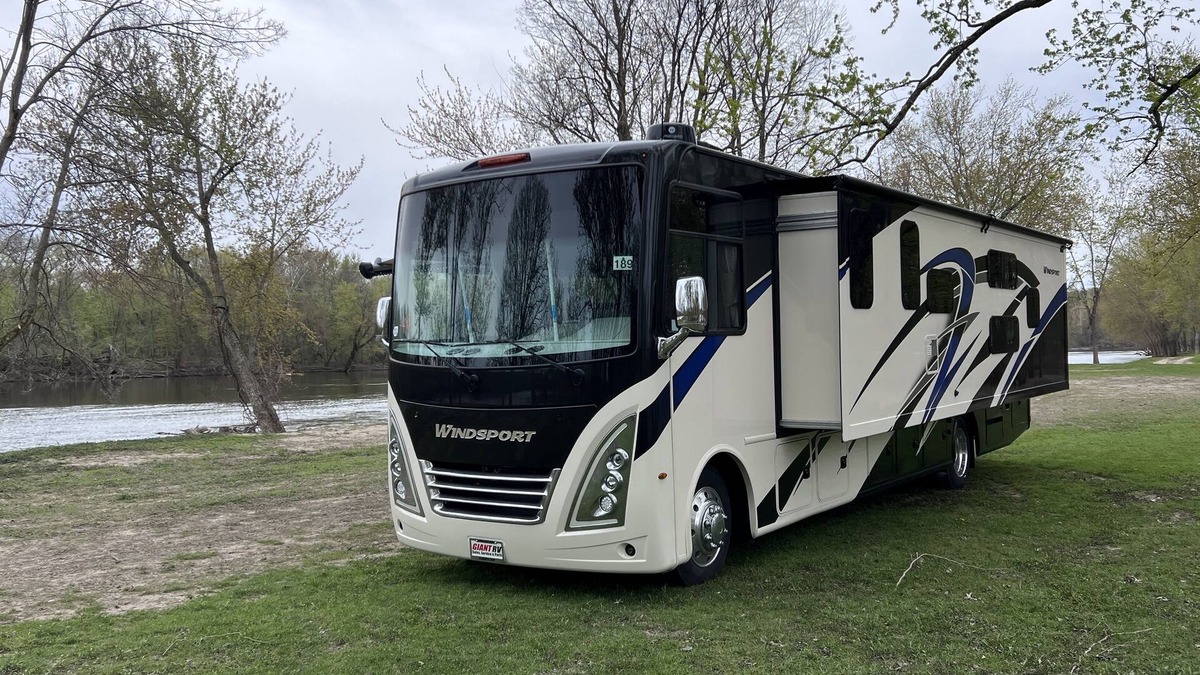 Walker House | Luxury RV with Bunkbeds Stationed on serene Grand River with private golf course
