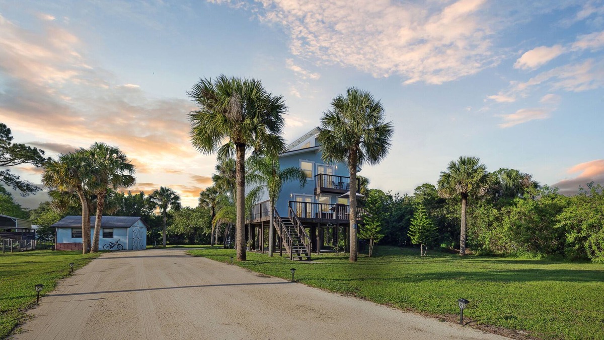 Cocoa House | Luxury Stilt Beach House in the Woods! 3/2.5 w/ Stocked Pond & Oasis on 1 ACRE!