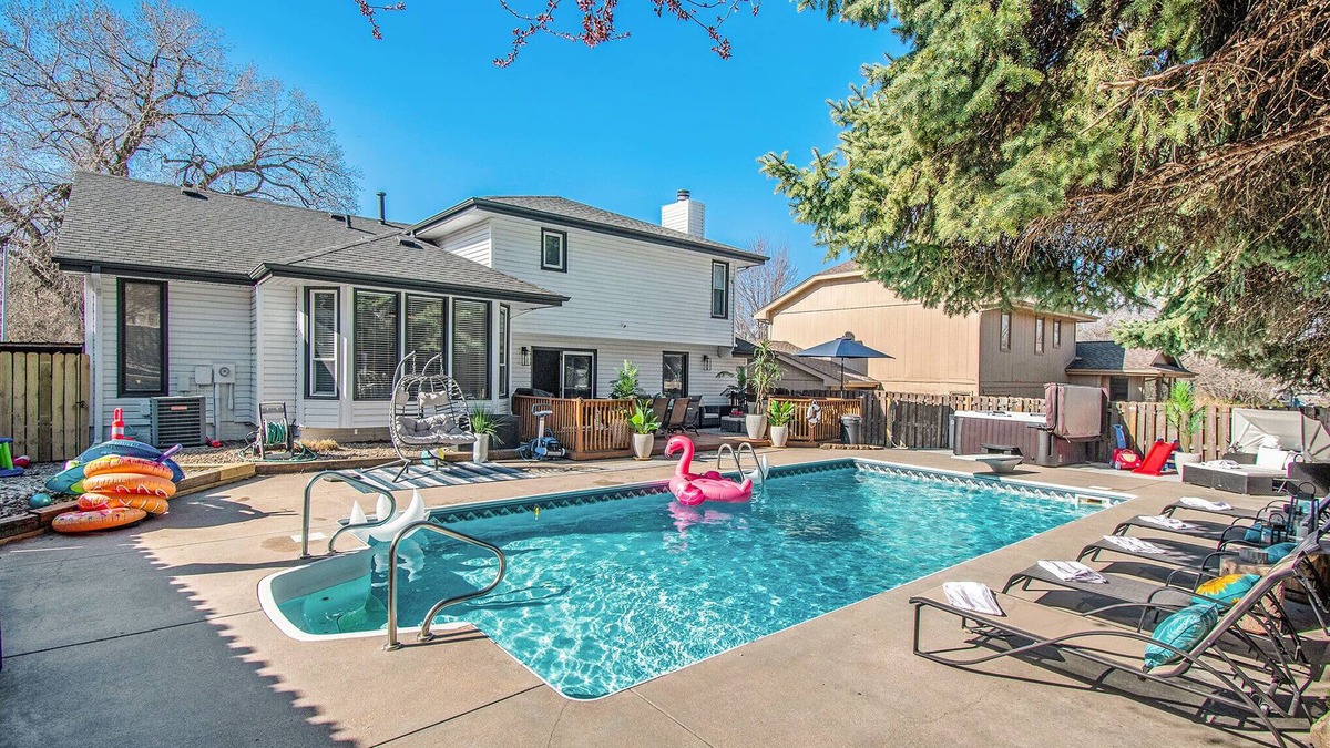 West Omaha House | Luxury vacation house, heated pool + hot tub