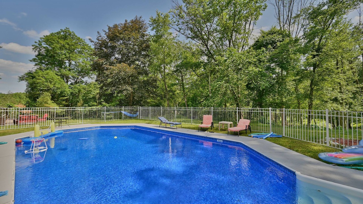 Stroudsburg House | Luxury Villa in the heart of Poconos with Pool, Hot Tub, Sauna, and Game Room
