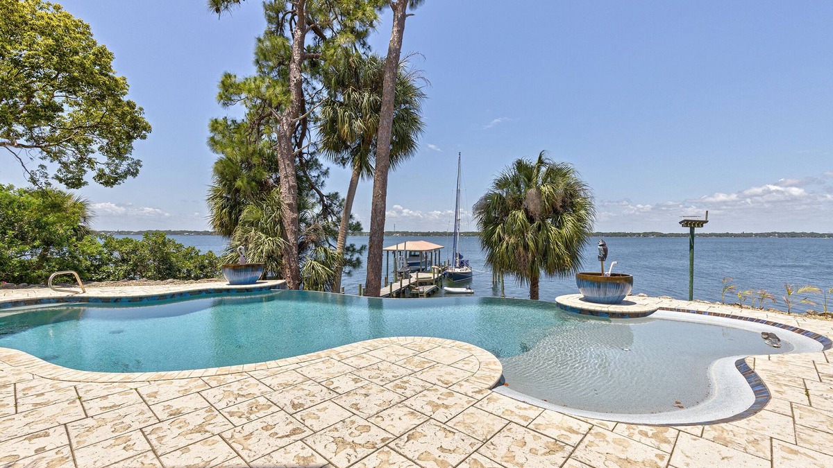 Tropic Villa | Luxury Waterfront Retreat, near Cocoa Beach, Kennedy Space Center, Disney World