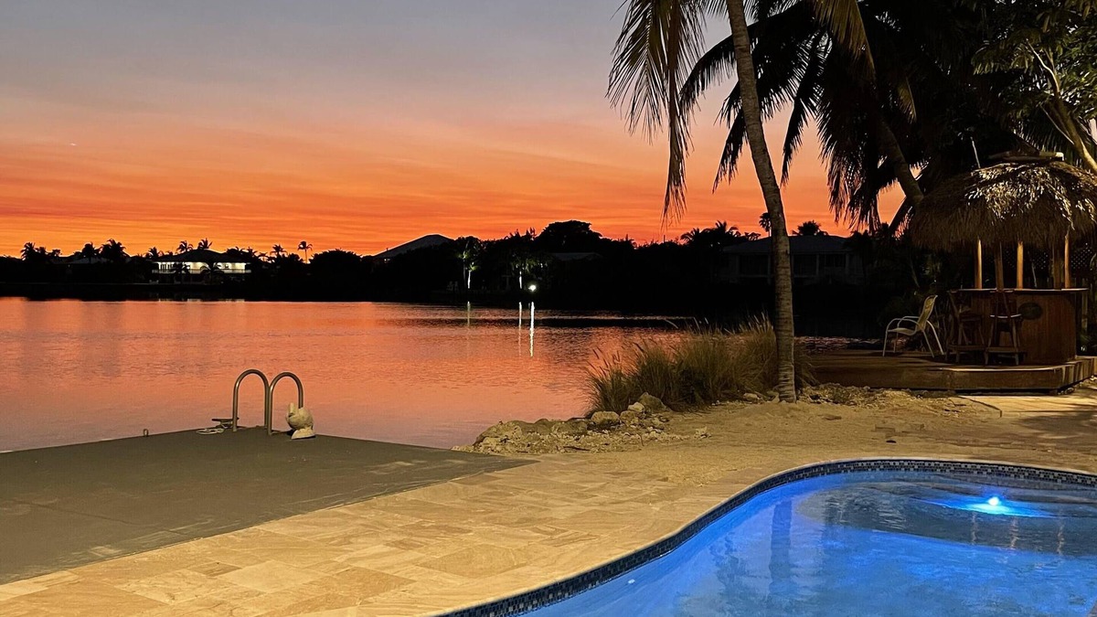 Sugarloaf Shores House | Luxury Waterfront Home with Gorgeous Pool, Tiki Bar and Sunsets