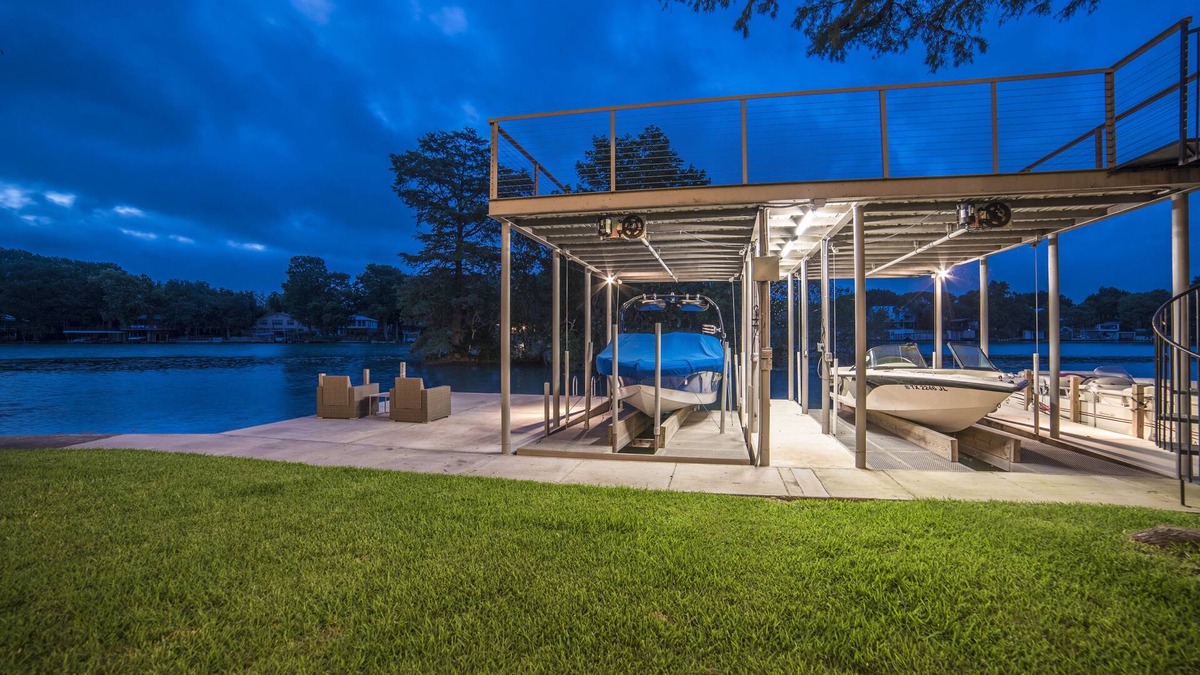 McQueeney House | Luxury Waterfront Lakehouse with Volleyball, Boat Dock, Fire Pit, 8 bedrooms