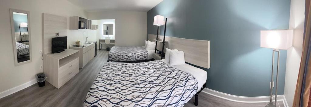 Kingsland Hotel | Magnolia Inn Extended Stay of Kingsland - New 2024 - Book a Kitchen Room - 12 Noon Check Out - Sleep In Late - Better Sleep - Ultra Sparkling - Pool open until until 4AM - Stay and Save Today - 24 Hour Front Desk - Premium Coffee Bar - Award Winning Inn