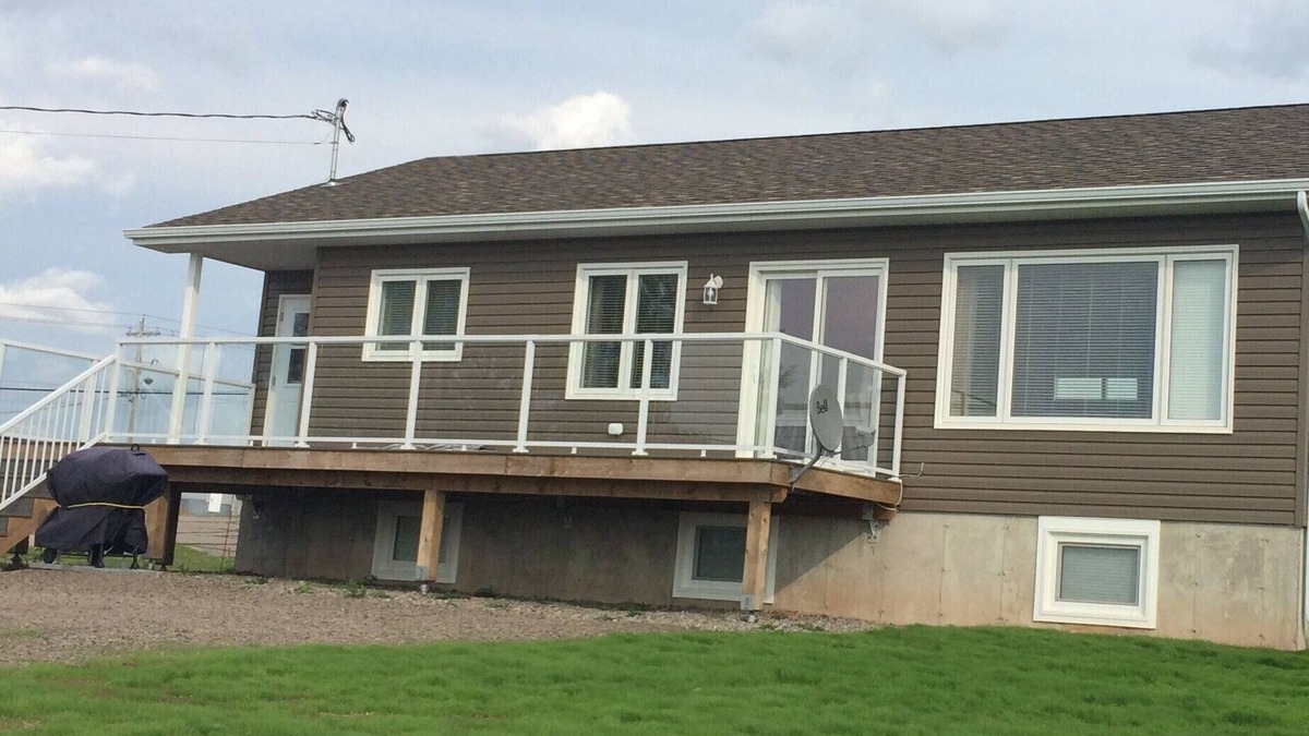 Cheticamp House | Main Floor (Unit 1) in House, Deck, Sunset, Water View (Cheticamp Harbour)