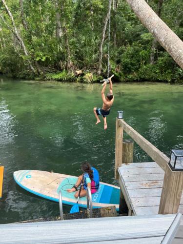 Weeki Wachee Gardens Villa | Main River Retreat hot tub, canoe with trolling motor