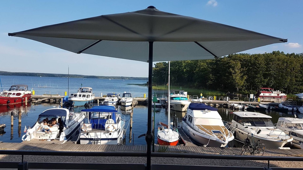 Plau am See Apartment | Maisonette Jocki (house 6 no. 55) with fantastic views over the lake and harbor