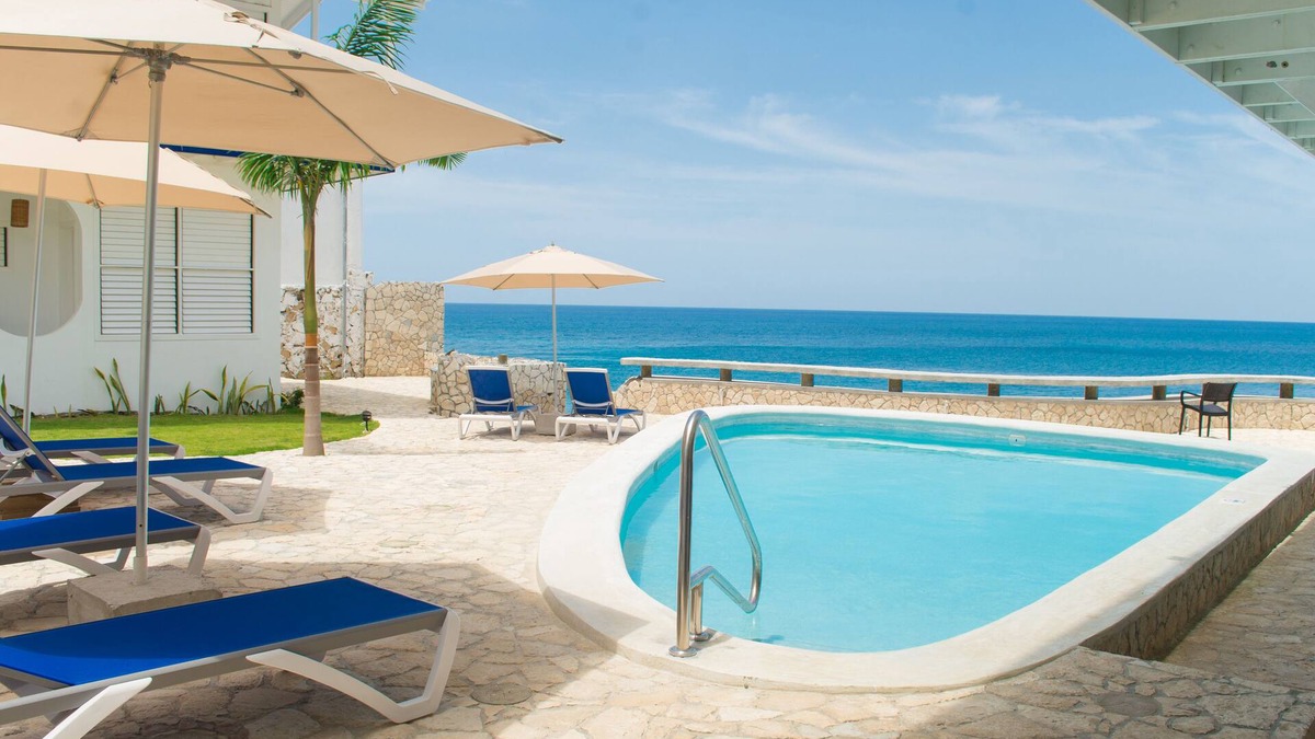 West End Resort | Mango Rooms at Begona is a cliffside hotel with stunning Caribbean sunset views
