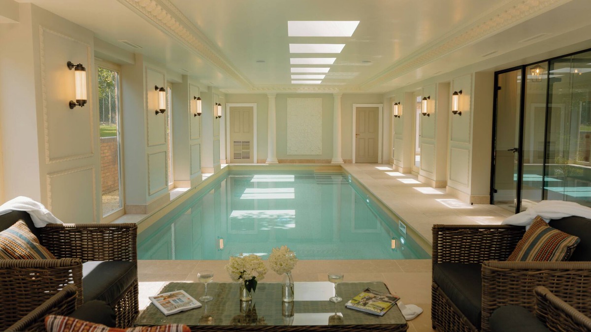 Malpas House | Manor home sleeping 18 guests , indoor pool, spa suite, hot tub, cinema room, outdoor kitchen & bar