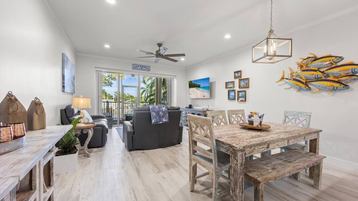 Rock Harbor House | Marina-View 3BR/3BA Mariner's Club Townhouse 202 with Oasis Pool, Marina, Game Room & More