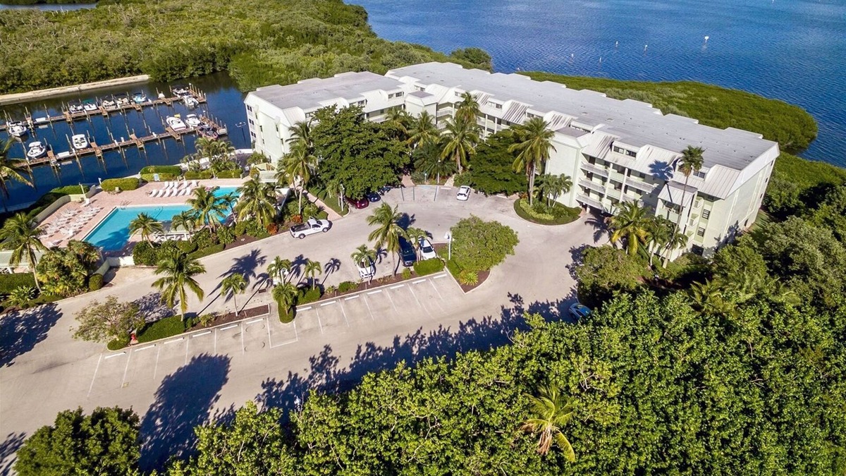 Captiva House | Marina views, heated pool, hot tub, short walk to the beach