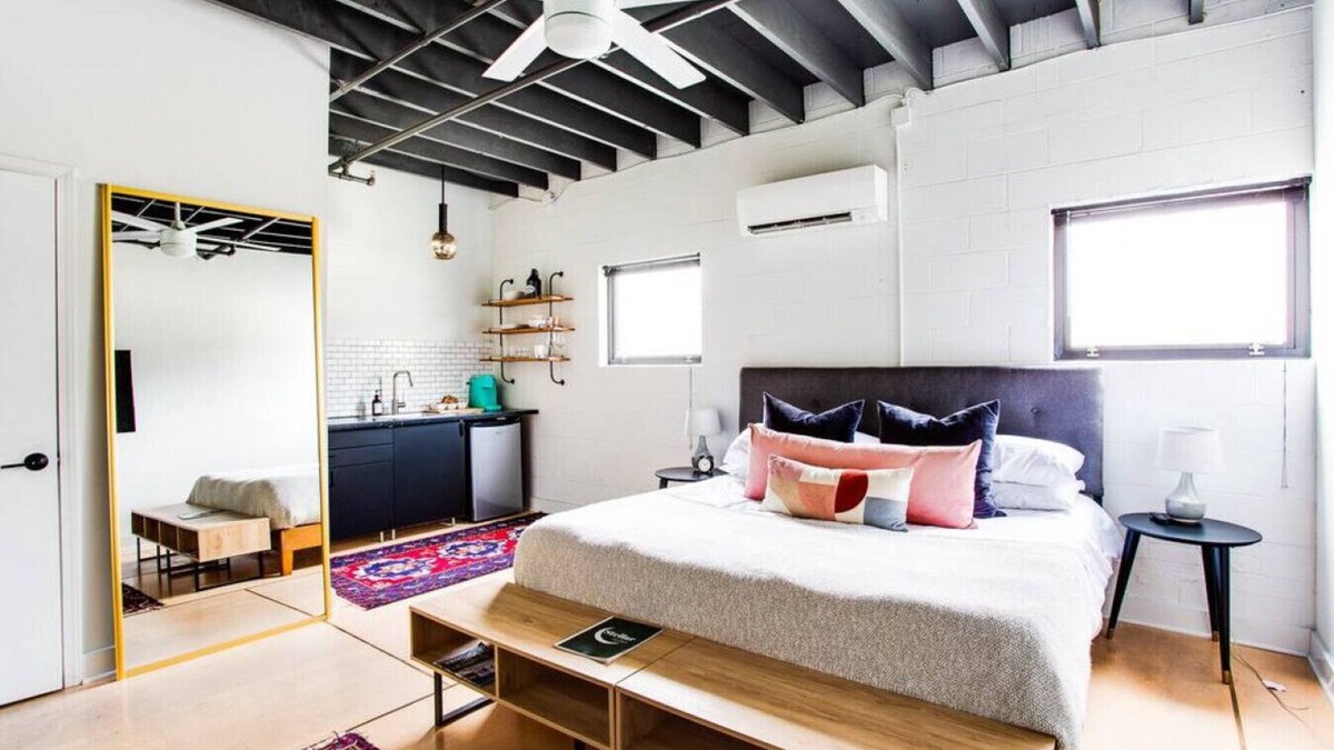 East Market District Apartment | Market #6 · Stellar Suites | Ruby King Suite in NuLu | Bikes
