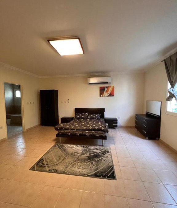 Doha Apartment | Master bedroom with entertaining facilities & Swimming pool