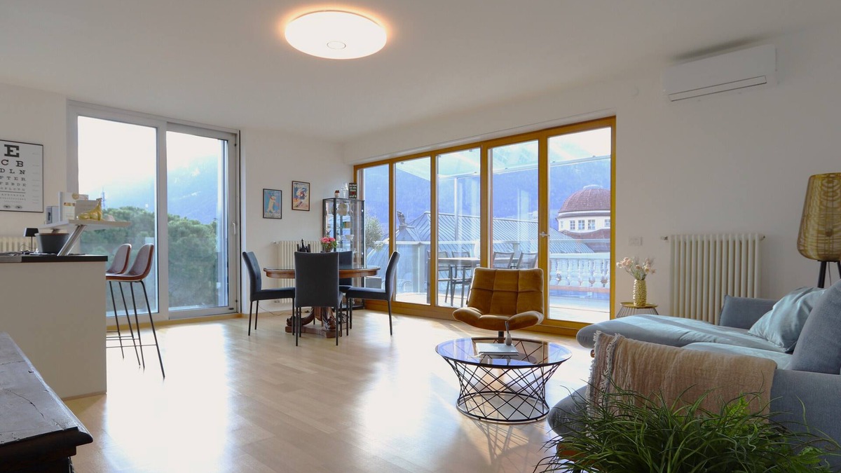 Merano Apartment | Merano center penthouse with terrace, garage, bike room and infrared sauna.