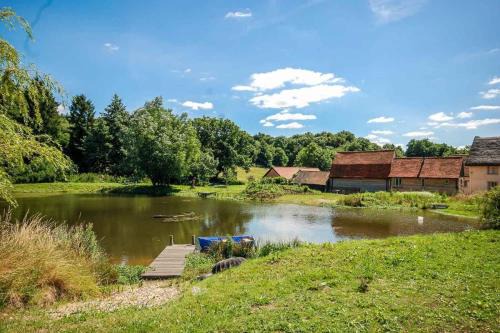 Assington House | Mill Cottage set beside a Mill pond in a 70 acre Nature Reserve Bliss