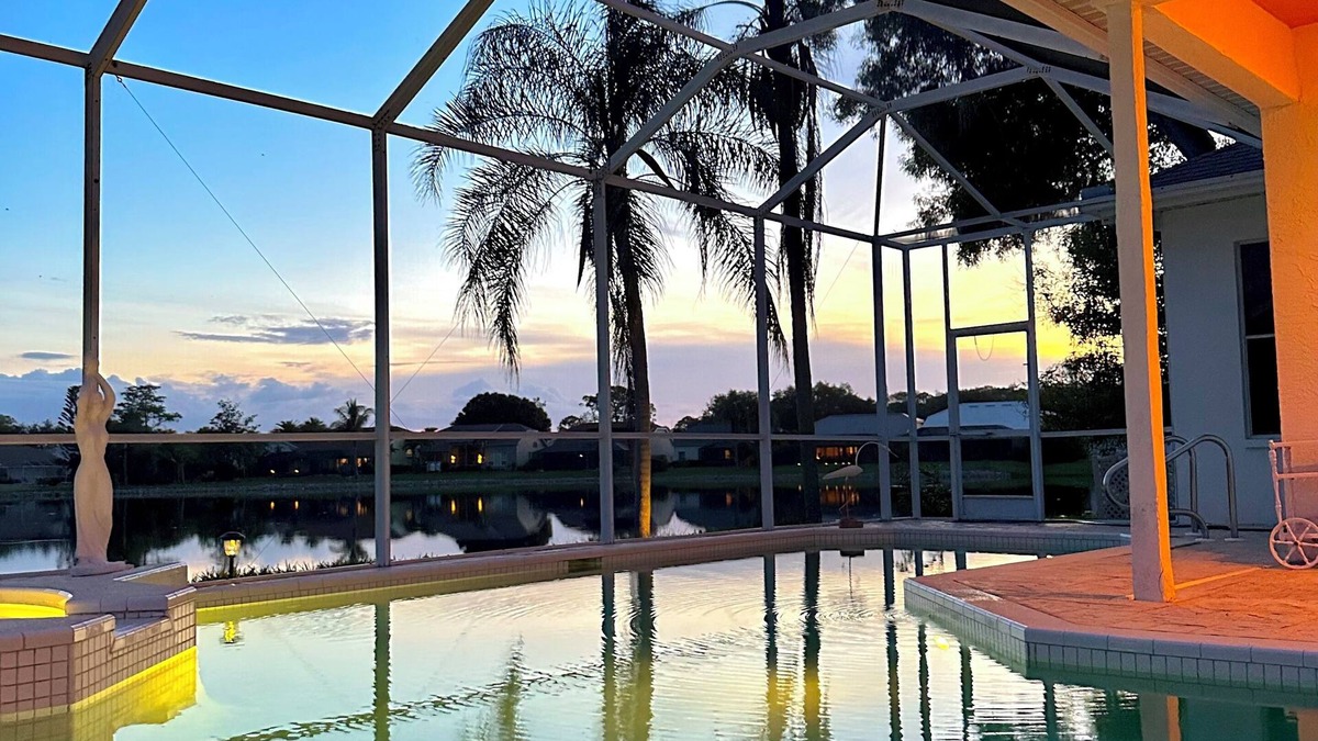 Naples House | Million dollar lake views; 4-bed 3 bath pool house- Old World Charm in Naples FL