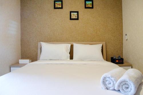 Bekasi Barat Apartment | Minimalist and Comfy 1BR Grand Kamala Lagoon Apartment By Travelio