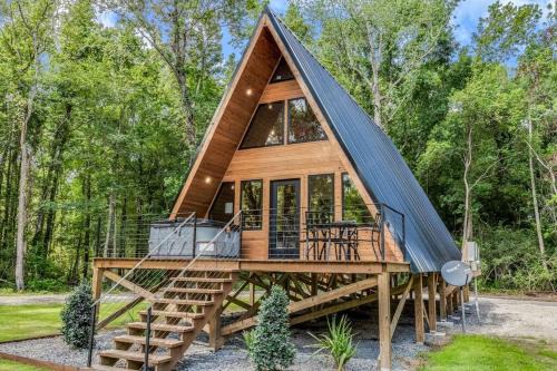New Iberia Apartment | Modern A-Frame Cabin by Rip Van Winkle with Hot Tub