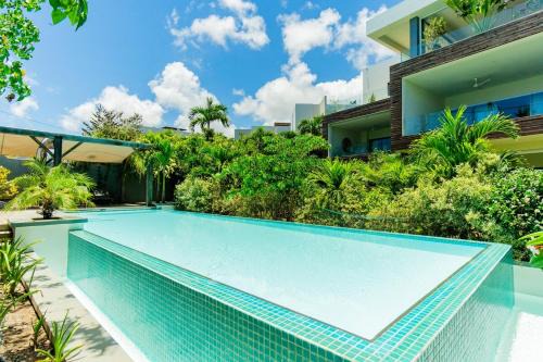Pointe aux Canonniers Apartment | Modern Apartment near the Beach