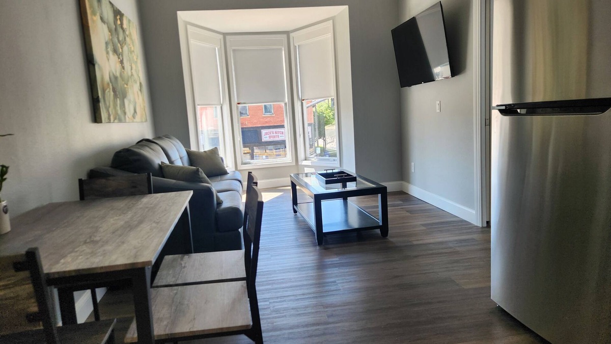 Iola Apartment | Modern Apartment on the Square