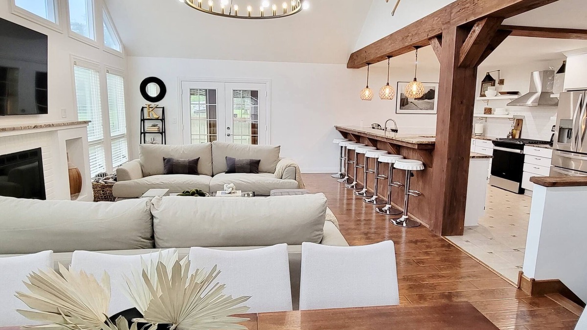 Paw Paw Lake House | Modern cottage w/sauna, fire pit, outdoor dining, pool table, & sunroom