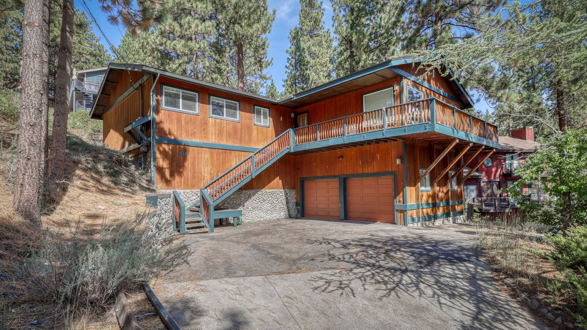Zephyr Cove Cabin | Modern cabin with fireplace, spacious deck, & beautiful forest views, sleeps 6