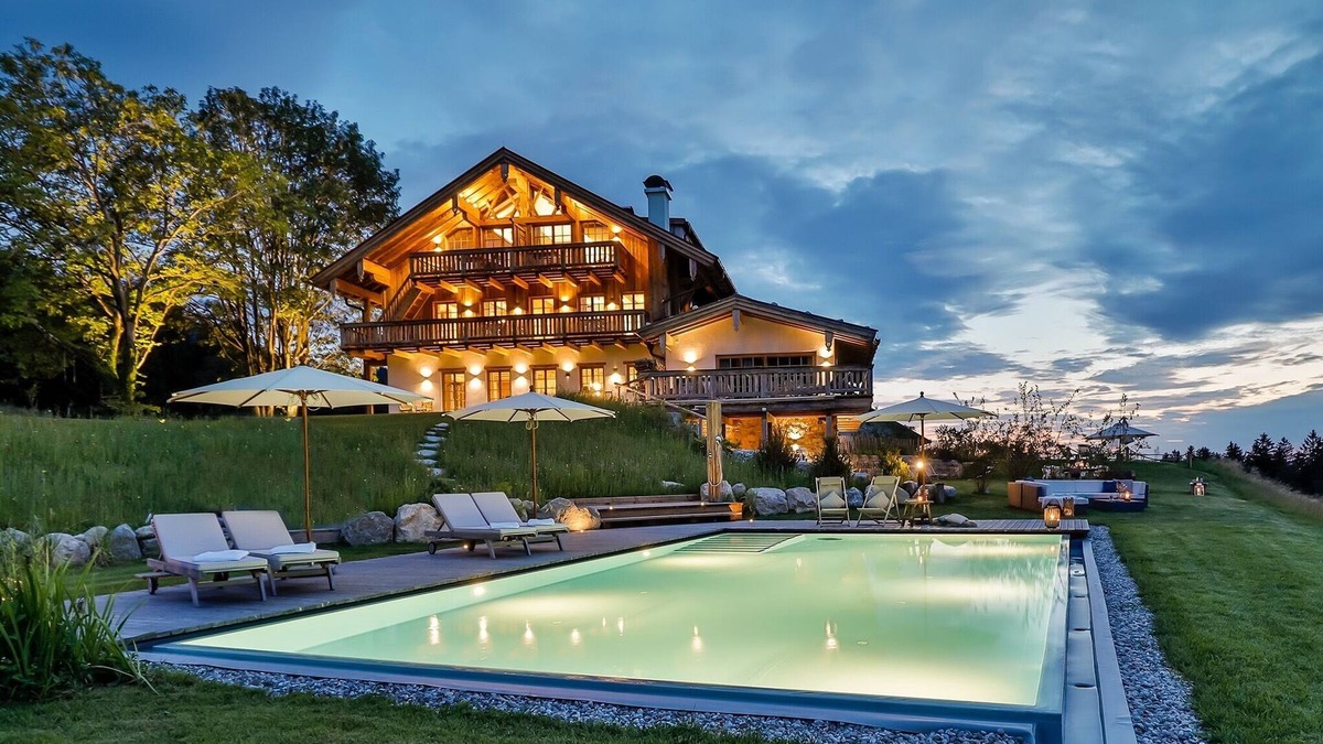 Frasdorf Apartment | Modern chalet style with private sauna, fireplace, hot tube, pool with Chiemsee view