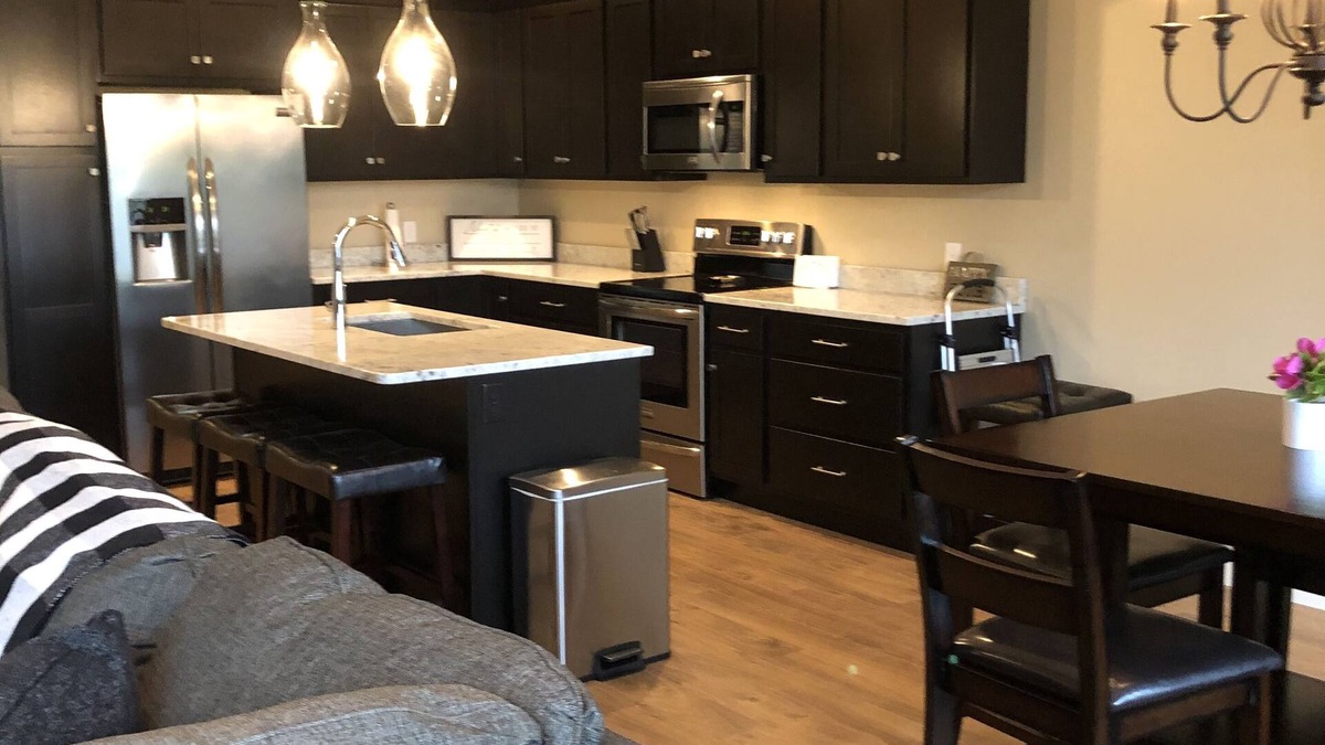 Arnolds Park Condo | Modern clean 2BR/2BA condo with patio & grill, in the heart of Okoboji, IA.