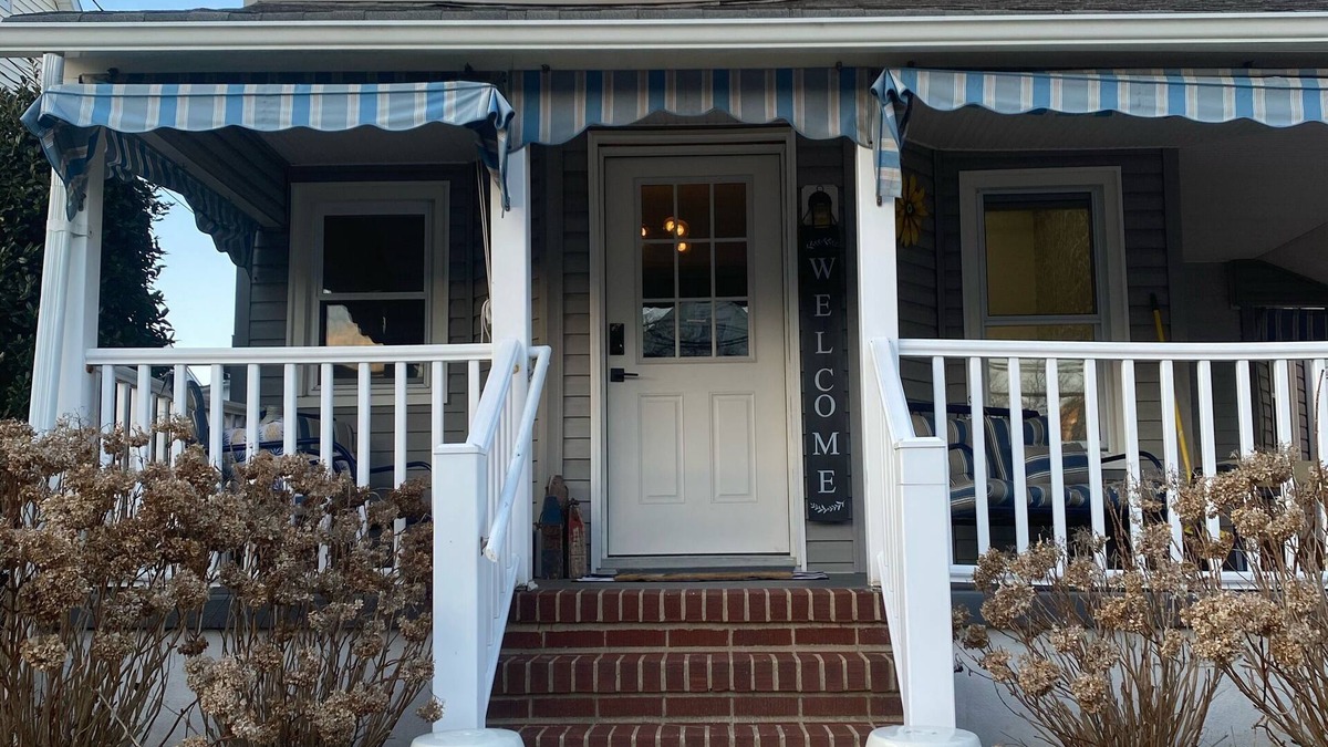 Bradley Beach House | Modern Colonial with lemonade porch and backyard oasis with in-ground heated spa