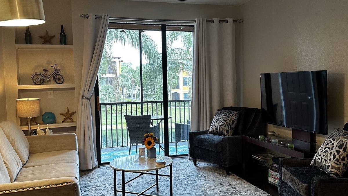 Sarasota Condo | Modern condo in resort style gated community with large pool, gym, tennis, bbq.