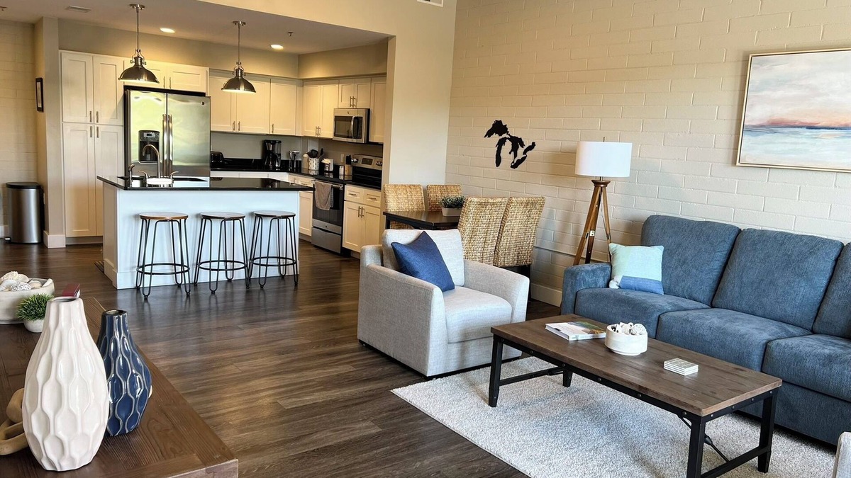 Manistee Condo | Modern condo on Manistee River just steps away from downtown!
