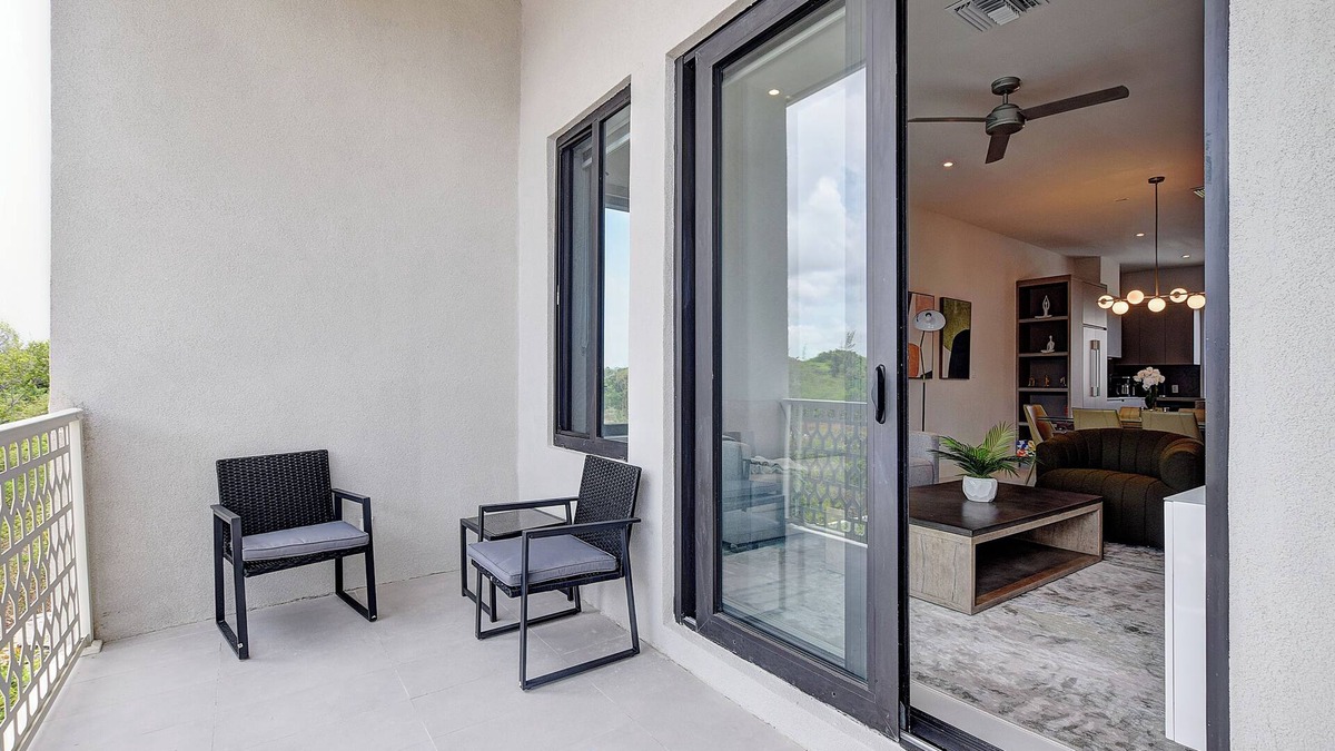 Westwind Condo | Modern condo, steps to beach. Gym, generator, gated community.