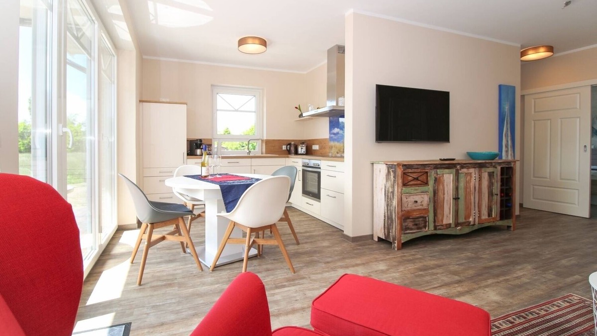 Norden Apartment | Modern first floor apartment with sauna and beach chair in the garden for 4 persons
